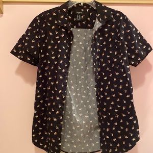 Black Men’s button up floral shirt.